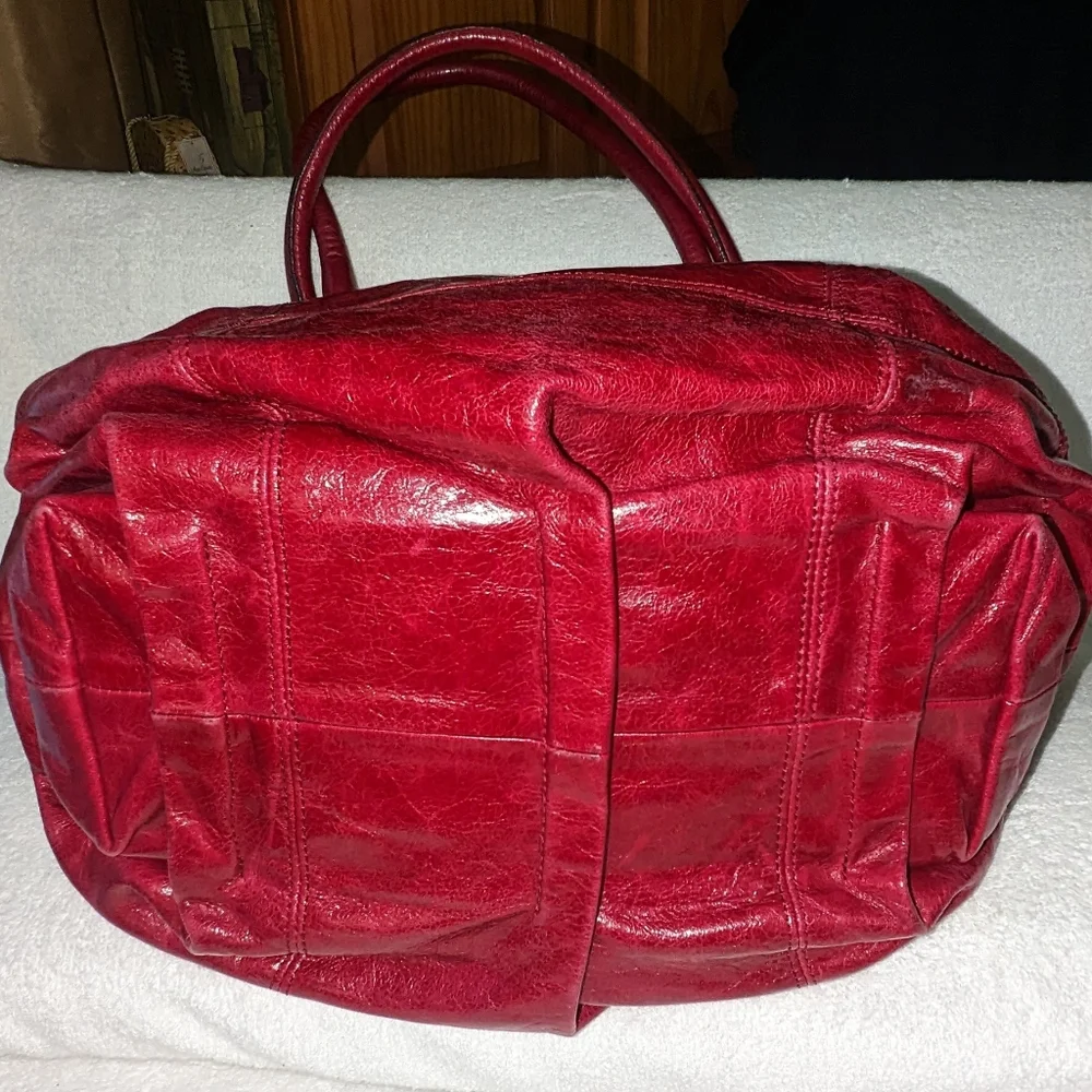 Abro burgundy red leather pleated details hobo bag.